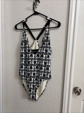 Shade & Shore Black and White Printed Junior  One-Piece -Straps are adjustable.